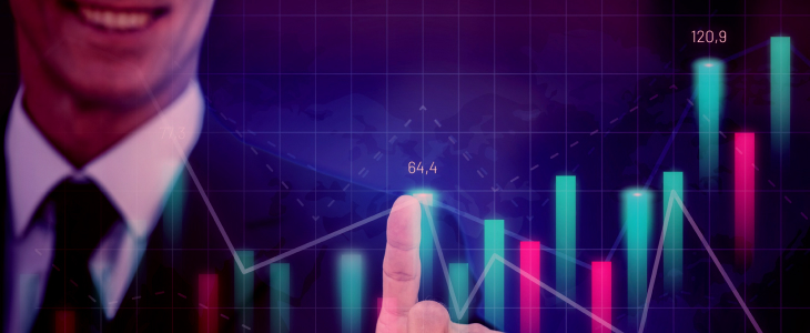 A man in a suit points at a forex chart, analyzing data with a focused expression.
