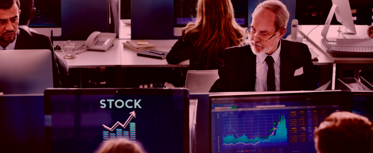 Office space with forex brokers analyzing stock movements.