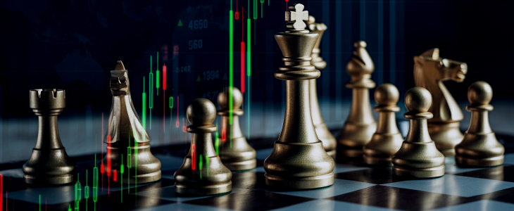 Chess pieces arranged on a table beside a stock market chart, symbolizing strategy in both games and financial markets.