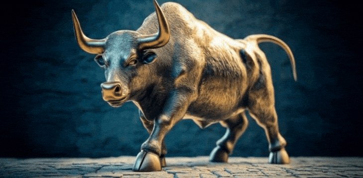 A bull stands confidently against a dark background, showcasing its muscular build and strong presence.