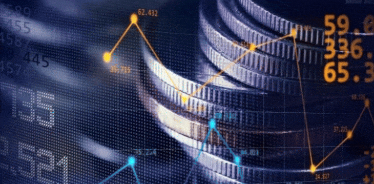 Close-up of a stack of coins with a financial graph overlay, illustrating economic growth and investment trends.
