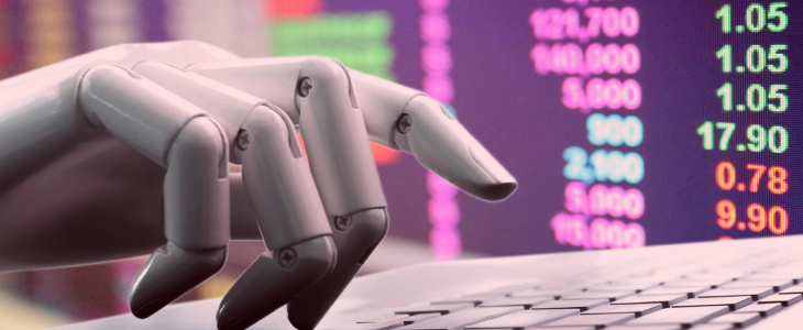A robotic hand rests on a laptop displaying stock market data and graphs.