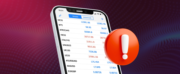 Mobile device displaying trading application with a danger sign symbolizing value at risk in forex