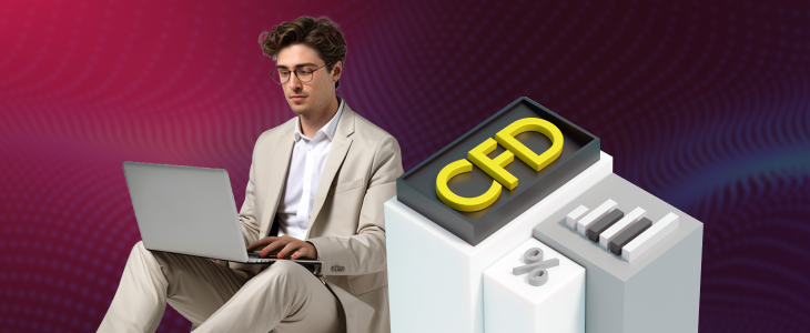 A man dressed in a suit is seated with a laptop, focused on CFDs for tech stocks on NASDAQ.